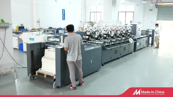 Applicatore automatico di etichette per etichettatrice per intarsio RFID con 4 teste